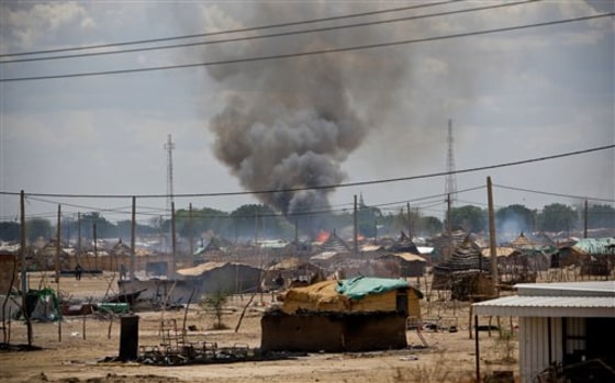 In this photo released by the United Nations Mission in Sudan (UNMIS), homes are seen burning in the town of Abyei, an area claimed by both northern and southern Sudan.